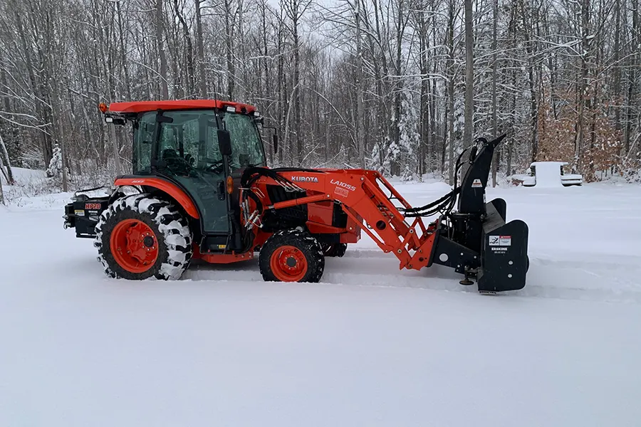 skid steer snow blower mounted on tractor